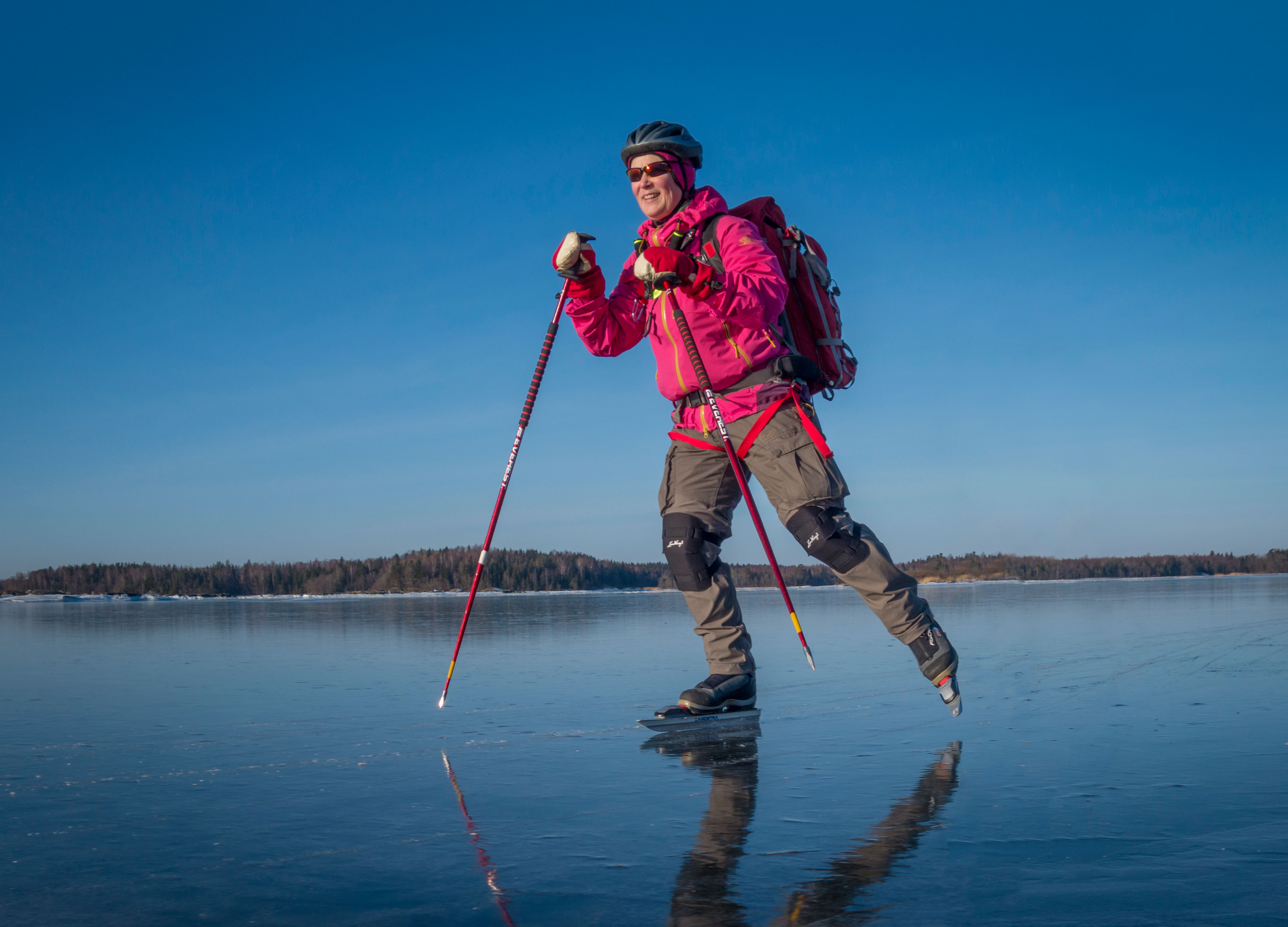 mp25775195-woman-ice-skating-on-lake-in-sweden.jpg